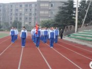 低碳环保 绿色生活--我校举行2014-2015学年下期第二周升旗仪式